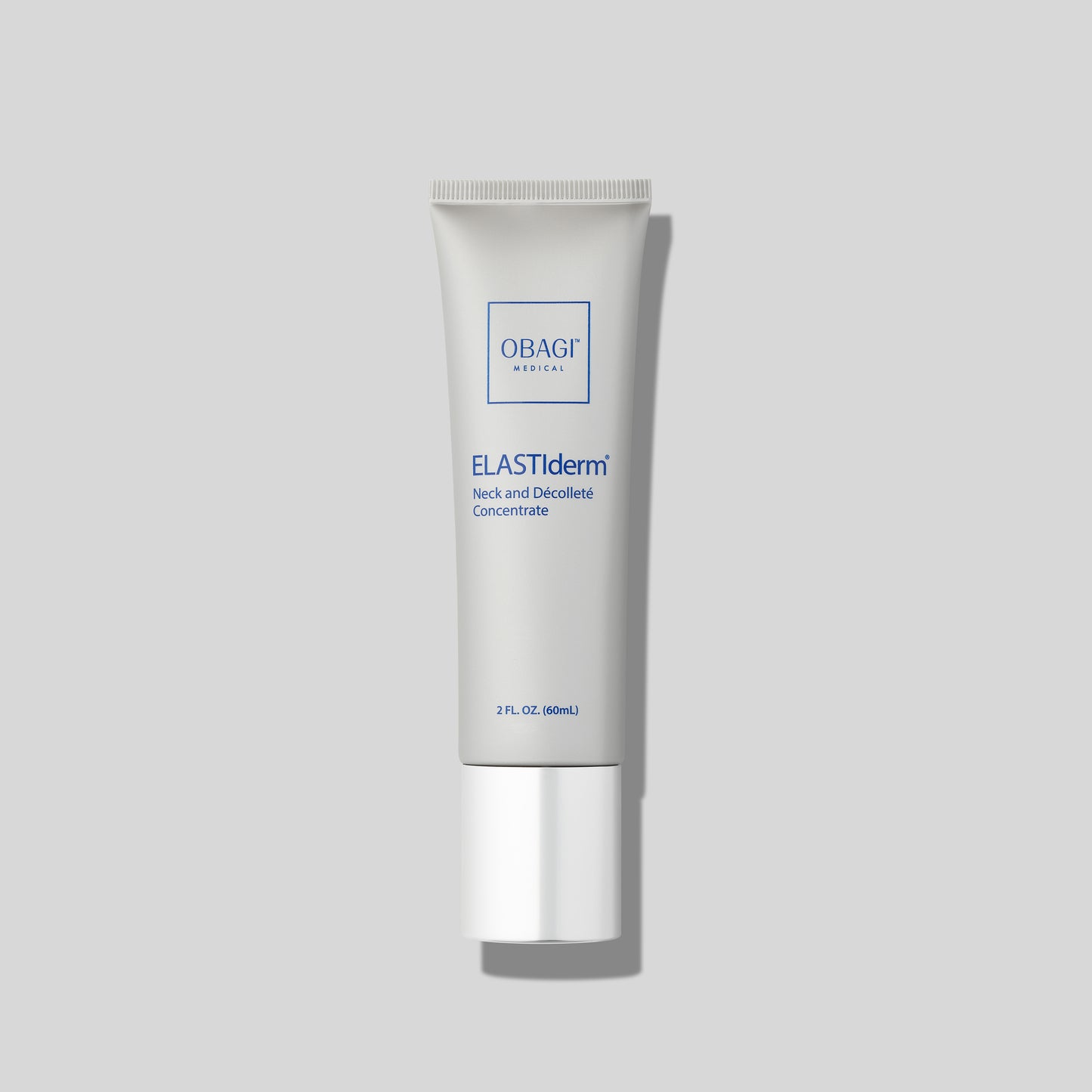 Obagi Medical ELASTIderm Neck and Décolleté Concentrate tube, 2 fl. oz. size, displayed on a light gray background with sleek, minimalist packaging and blue text.