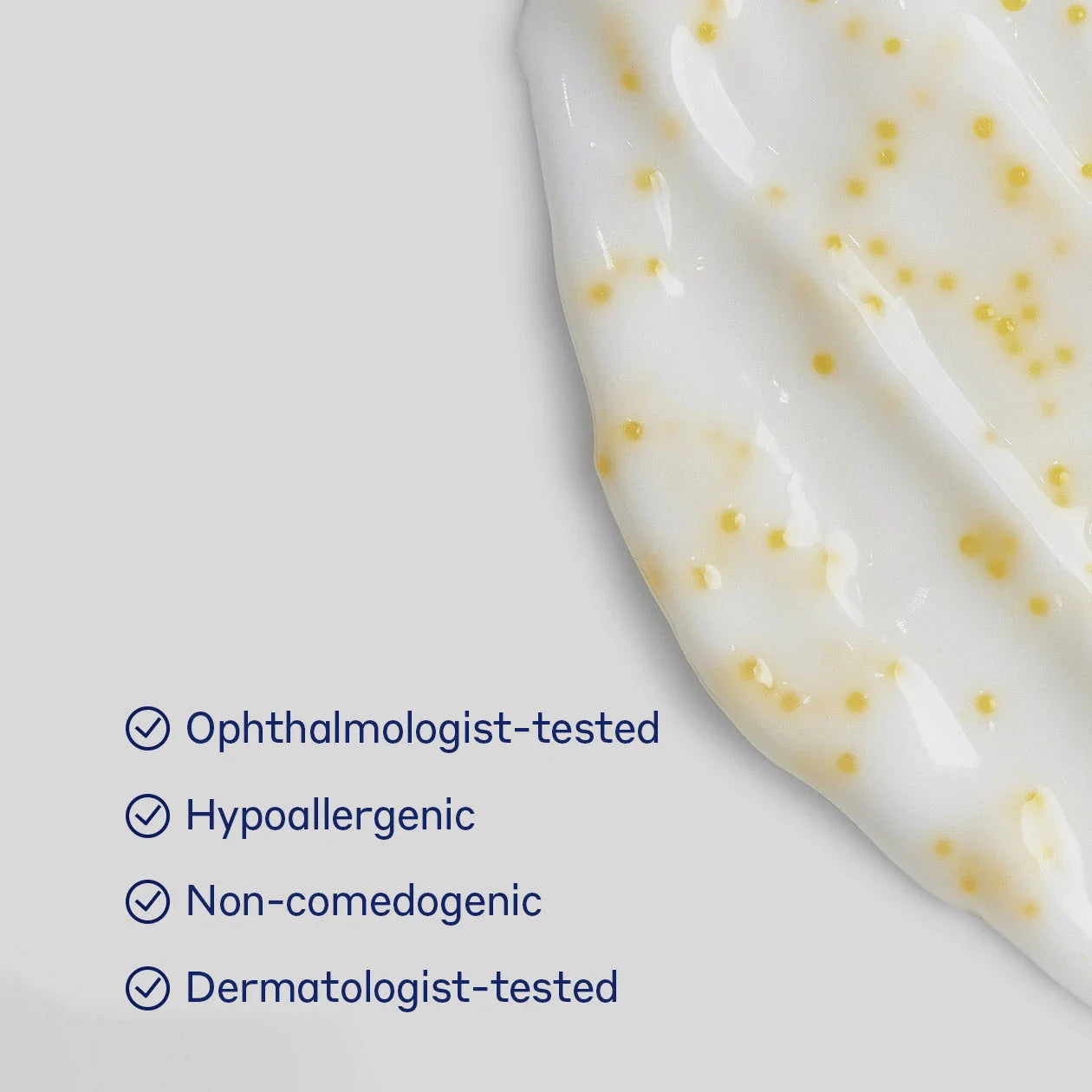 A close-up of the Obagi ELASTIderm® Eye Serum applicator tip with a drop of serum on the silver rollerball, highlighting its cooling, targeted design to reduce puffiness and fine lines around the eyes.